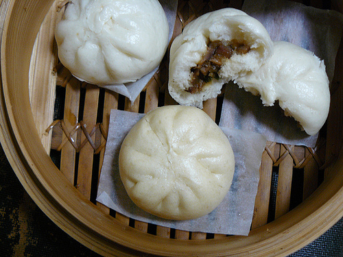 Steamed filled buns (bao) filled with charsiu Steamed filled buns (bao) filled with charsiu