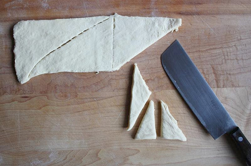 cutting dough for pigs in blanket