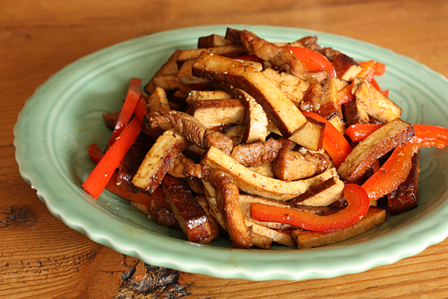 Asian Tofu: tea-smoked tofu, pepper, and pork stir-fry