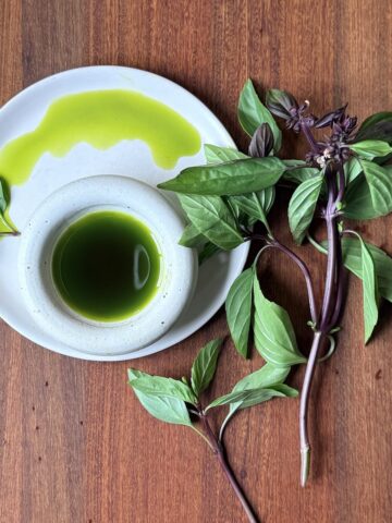 green herb oil made with thai basil